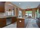 Kitchen features island, stainless steel appliances, and breakfast nook at 20103 Shady Hill Ln, Tampa, FL 33647