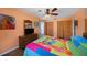Bright bedroom with a comfortable bed, dresser, and large closet at 3120 Beach S Blvd # 7, Gulfport, FL 33707