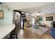 Living room with spiral staircase and stone floors at 3120 Beach S Blvd # 7, Gulfport, FL 33707