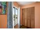 Guest bedroom with window, closet, and view at 3120 Beach S Blvd # 7, Gulfport, FL 33707