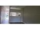 Living room with view into kitchen and hallway at 6212 Bayside Key Dr, Tampa, FL 33615