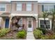 Two-story townhome with landscaped front yard at 6212 Bayside Key Dr, Tampa, FL 33615
