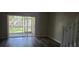 Living room with sliding glass doors to patio at 6212 Bayside Key Dr, Tampa, FL 33615