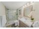 Bright bathroom with a toilet, shower, and vanity at 6372 Palma Del Mar S Blvd # 320, St Petersburg, FL 33715