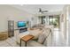 Bright living room, featuring a sectional sofa and fireplace at 6372 Palma Del Mar S Blvd # 320, St Petersburg, FL 33715