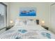 Relaxing bedroom with coastal decor and comfortable bedding at 6372 Palma Del Mar S Blvd # 320, St Petersburg, FL 33715
