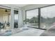 Main bedroom with private balcony and water views at 6372 Palma Del Mar S Blvd # 320, St Petersburg, FL 33715