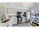 Modern kitchen with stainless steel appliances and white cabinets at 6372 Palma Del Mar S Blvd # 320, St Petersburg, FL 33715