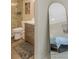 Bathroom with marble shower, vanity with drawers, and full-length mirror at 6372 Palma Del Mar S Blvd # 320, St Petersburg, FL 33715