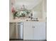 Updated kitchen boasts stainless steel appliances and white cabinetry at 6372 Palma Del Mar S Blvd # 320, St Petersburg, FL 33715