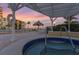 Enjoy the sunset view from the hot tub under a pergola at 6372 Palma Del Mar S Blvd # 320, St Petersburg, FL 33715