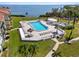 Elevated view of waterfront pool and lounge area at 6372 Palma Del Mar S Blvd # 320, St Petersburg, FL 33715