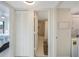 View of bathroom and laundry area from hallway at 6372 Palma Del Mar S Blvd # 320, St Petersburg, FL 33715