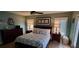 Cozy bedroom with a dresser and bed at 699 140Th E Ave, Madeira Beach, FL 33708