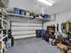 Garage with overhead storage and shelving at 7112 Estero Ct, Apollo Beach, FL 33572