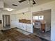 Kitchen area during remodel, showing damaged walls and floors at 4354 50Th S Ter, St Petersburg, FL 33711