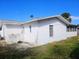 White single story house with a window and needs some exterior work at 4354 50Th S Ter, St Petersburg, FL 33711