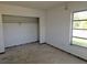 Unfinished bedroom with closet and window at 4354 50Th S Ter, St Petersburg, FL 33711