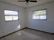 Empty bedroom with two windows and closet at 4354 50Th S Ter, St Petersburg, FL 33711