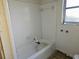 Small bathroom with a bathtub and tiled walls needs updating at 4354 50Th S Ter, St Petersburg, FL 33711