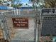 Entrance to Ron McKenney Dog Park, featuring a welcome sign and park rules at 469 80Th Way, St Pete Beach, FL 33706