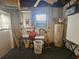 Unfinished basement with water heater and ample storage at 469 80Th Way, St Pete Beach, FL 33706