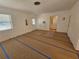 Spacious living room with light walls and vinyl flooring at 469 80Th Way, St Pete Beach, FL 33706