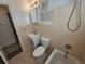 Bathroom with tub, toilet, and vanity at 469 80Th Way, St Pete Beach, FL 33706