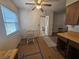 Kitchen with table, cabinets and window at 469 80Th Way, St Pete Beach, FL 33706