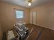 Bright bedroom with a window, closet, and ceiling fan at 469 80Th Way, St Pete Beach, FL 33706