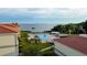 An aerial view showcasing the community pool and the waterfront location at 6372 Palma Del Mar S Blvd # 320, St Petersburg, FL 33715