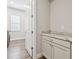 Laundry room with granite countertop and white cabinets at 101 Brookover Ln, Brandon, FL 33511