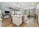 Open kitchen with large island, stainless steel appliances, and ample counter space at 101 Brookover Ln, Brandon, FL 33511