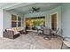 Covered patio with seating area and pool view at 101 Brookover Ln, Brandon, FL 33511