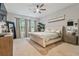 Spacious Primary bedroom with a luxurious bed at 101 Brookover Ln, Brandon, FL 33511