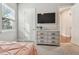 Bright bedroom with a comfortable bed and built-in dresser at 101 Brookover Ln, Brandon, FL 33511