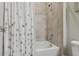 Bathroom with shower/tub combo and patterned curtain at 101 Brookover Ln, Brandon, FL 33511