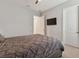 Spacious bedroom with a large bed and access to a bathroom at 101 Brookover Ln, Brandon, FL 33511