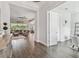 Open entryway with views to the living room and office at 101 Brookover Ln, Brandon, FL 33511