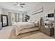 Spacious primary bedroom with large window and plush carpet at 101 Brookover Ln, Brandon, FL 33511