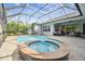 Enclosed pool and spa with patio seating at 101 Brookover Ln, Brandon, FL 33511