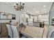 Bright dining room featuring a rustic wooden table at 101 Brookover Ln, Brandon, FL 33511