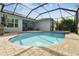 Relaxing pool and spa with screened patio at 101 Brookover Ln, Brandon, FL 33511