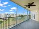 Spacious screened balcony overlooking a golf course at 1200 Country Club Dr # 4504, Largo, FL 33771