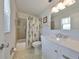 Bathroom featuring a vanity with countertop space, a shower, and modern fixtures at 1529 Allegheny Dr, Sun City Center, FL 33573