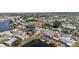 Wide aerial view of home and surrounding waterfront community at 1706 Flamingo Ln, Sun City Center, FL 33573