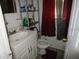 Bathroom with vanity, toilet, and shower/tub combo at 1800 Patton S Ave, St Petersburg, FL 33712