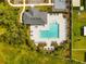 Resort-style pool with spacious deck and lounge chairs at 1911 Fan Aloe Way, Ruskin, FL 33570