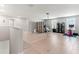 Versatile bonus room with hardwood floors, perfect for a home gym or office at 1911 Fan Aloe Way, Ruskin, FL 33570
