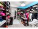 Large walk-in closet with ample shelving and hanging space at 1911 Fan Aloe Way, Ruskin, FL 33570